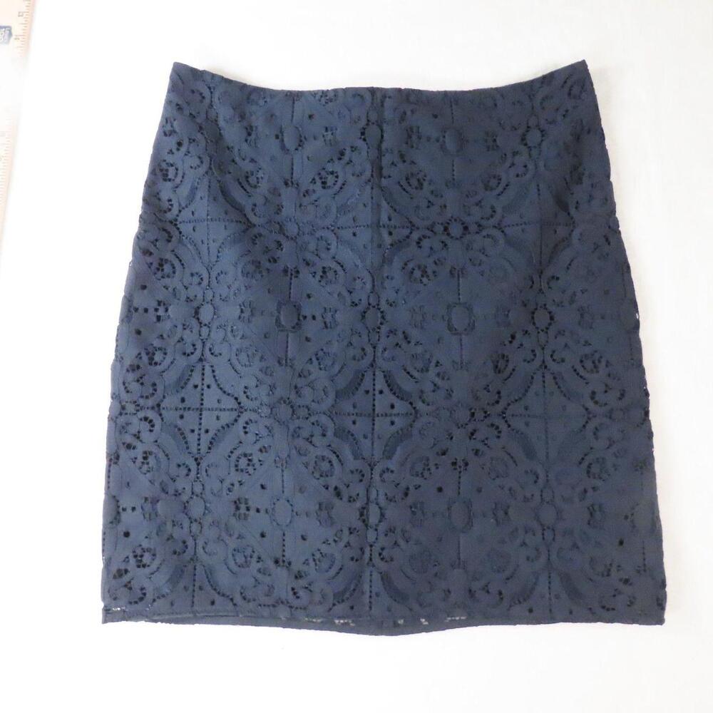 The Banana Republic Navy Blue Geometric Lace Overlay Mini Skirt in size 8 is a s